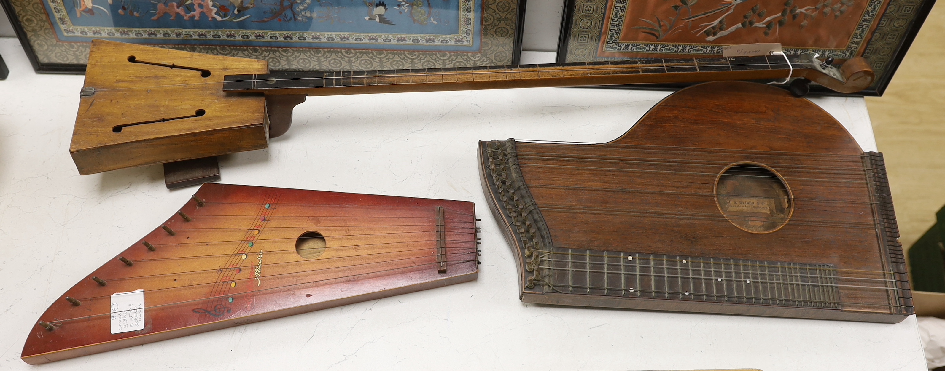 A single string fiddle, a zither and a Golden Music zither